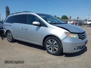 2014 Honda Odyssey Touring with VIN 5FNRL5H91EB068427, listed as a IAAI auction lot 42163315 with 184,134 mi miles and . Bid and sale history available at DreamBid. Image 14.