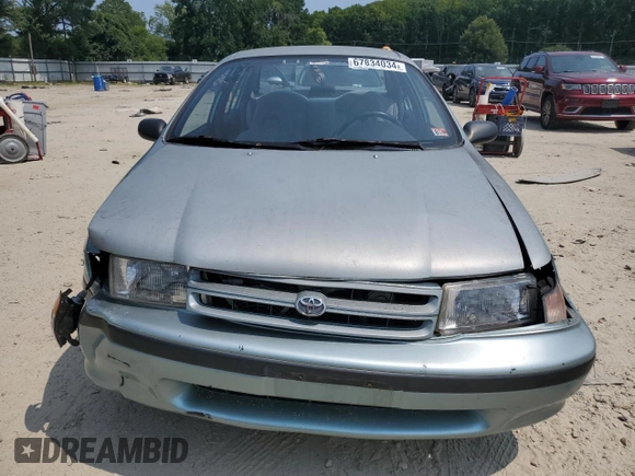1994 Toyota Tercel DX z VIN JT2EL43T3R0489039, wystawiony jako Copart lot #67834034 z przebiegiem 139 726 mil mil oraz Szkoda całkowita • Salvage title. Historia ofert i sprzedaży dostępna na DreamBid. Obrazek 5.