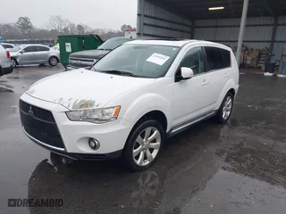 2010 Mitsubishi Outlander GT with VIN JA4JT5AXXAZ016007, listed as a IAAI auction lot 41595345 with 207,985 mi miles. Bid and sale history available at carsss.com. Image 2.