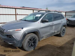2015 Jeep Cherokee Trailhawk with VIN 1C4PJMBS0FW522182, listed as a IAAI auction lot 42544508 with 74,910 mi miles and . Bid and sale history available at DreamBid. Image 17.