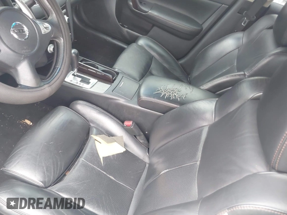 2014 Nissan Maxima S with VIN 1N4AA5AP5EC463435, listed as a IAAI auction lot 41960665 with 173,326 mi miles and . Bid and sale history available at DreamBid. Image 12.