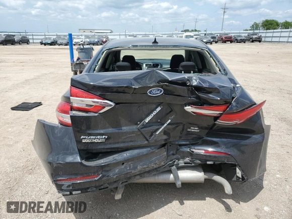2020 Ford Fusion SE z VIN 3FA6P0LUXLR254247, wystawiony jako Copart lot #60658095 z przebiegiem 76 413 mil mil oraz Szkoda całkowita • Salvage title. Historia ofert i sprzedaży dostępna na DreamBid. Obrazek 6.