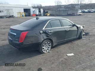 2015 Cadillac CTS Luxury AWD with VIN 1G6AX5SX3F0130311, listed as a IAAI auction lot 41299375 with 134,793 mi miles and . Bid and sale history available at DreamBid. Image 4.