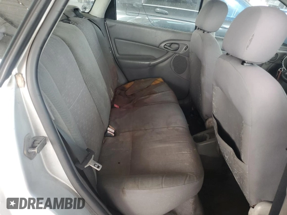 2004 Ford Focus ZX5 z VIN 3FAFP37394R122388, wystawiony jako Copart lot #45163225 z przebiegiem 259 554 mil mil oraz Czysty tytuł • Clean title. Historia ofert i sprzedaży dostępna na DreamBid. Obrazek 10.