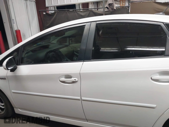 2011 Toyota Prius I with VIN JTDKN3DU1B0323839, listed as a IAAI auction lot 42099239 with 94,935 mi miles and . Bid and sale history available at DreamBid. Image 14.