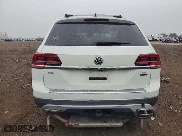 2018 Volkswagen Atlas SEL z VIN 1V2MR2CA4JC595070, wystawiony jako Copart lot #60683785 z przebiegiem 129 540 mil mil oraz Szkoda całkowita • Salvage title. Historia ofert i sprzedaży dostępna na DreamBid. Obrazek 6.