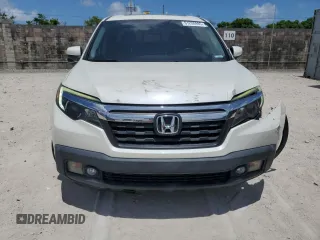 2019 Honda Ridgeline RTL-T z VIN 5FPYK2F68KB004930, wystawiony jako Copart lot #61200995 z przebiegiem 58 822 mil mil oraz Szkoda całkowita • Salvage title. Historia ofert i sprzedaży dostępna na DreamBid. Obrazek 5.