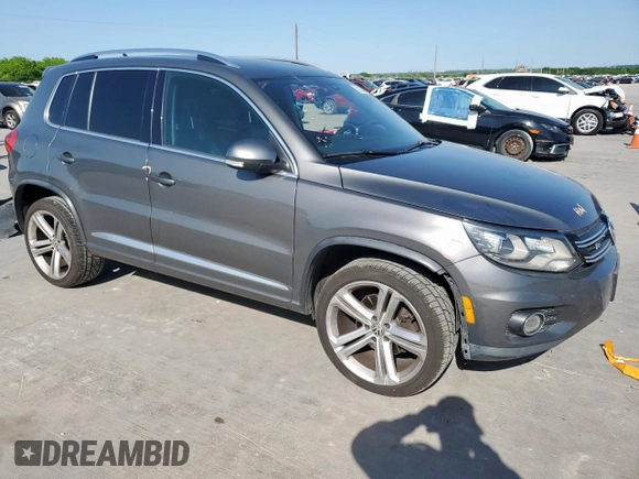 2014 Volkswagen Tiguan SEL z VIN WVGAV3AX6EW030705, wystawiony jako Copart lot #52156805 z przebiegiem 142 377 mil mil oraz Szkoda całkowita • Salvage title. Historia ofert i sprzedaży dostępna na DreamBid. Obrazek 4.