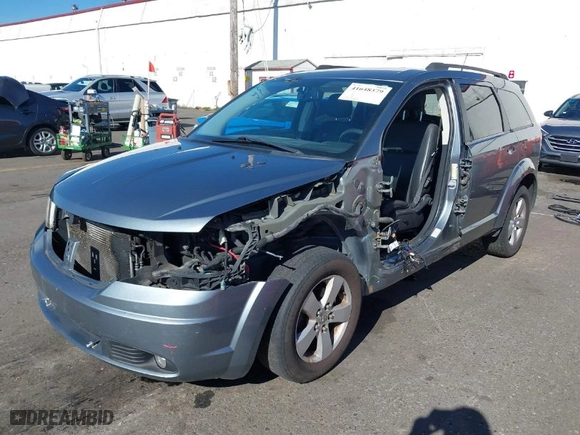 2010 Dodge Journey SXT with VIN 3D4PG5FV3AT146880, listed as a IAAI auction lot 41648379 with 123,341 mi miles. Bid and sale history available at carsss.com. Image 6.