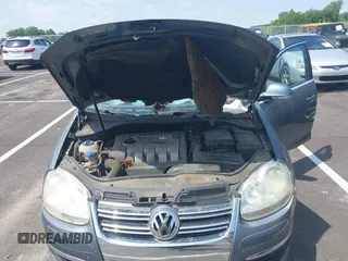 2006 Volkswagen Jetta 1.9L TDI z VIN 3VWST71K66M834544, wystawiony jako IAAI lot #42557527 z przebiegiem Nie podano mil oraz . Historia ofert i sprzedaży dostępna na DreamBid. Obrazek 10.