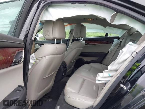 2014 Cadillac ATS Luxury AWD z VIN 1G6AH5SX0E0196052, wystawiony jako IAAI lot #41995886 z przebiegiem 97 531 mil mil oraz . Historia ofert i sprzedaży dostępna na DreamBid. Obrazek 8.