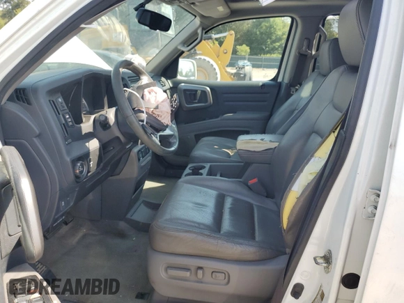 2013 Honda Ridgeline RTL with VIN 5FPYK1F58DB018007, listed as a Copart auction lot 69538464 with 165,590 mi miles and Salvage Title. Bid and sale history available at carsss.com. Image 7.