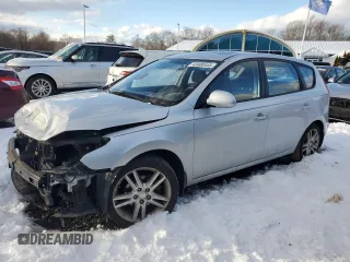 2009 Hyundai Elantra Touring z VIN KMHDC86E69U034424, wystawiony jako Copart lot #43400445 z przebiegiem 125 814 mil mil oraz Szkoda całkowita • Salvage title. Historia ofert i sprzedaży dostępna na DreamBid. Obrazek 1.