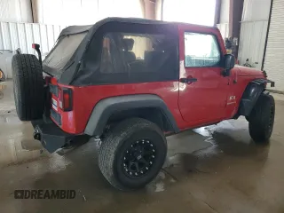 2009 Jeep Wrangler X с VIN 1J4FA24179L734789, выставлен на аукционе Copart как лот 54131245 с пробегом 98 239 миль миль и Списание • Salvage title. История ставок и продаж доступна на DreamBid. Изображение 3.