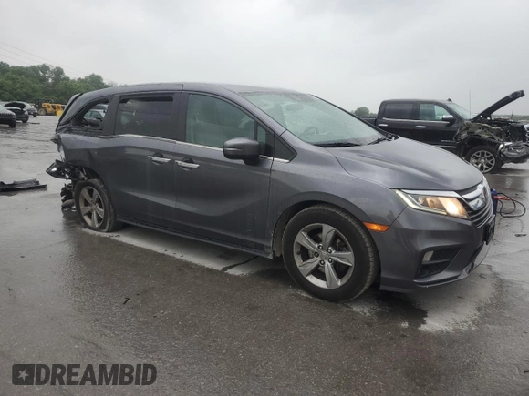 2018 Honda Odyssey EX with VIN 5FNRL6H50JB047999, listed as a Copart auction lot 57819495 with 121,295 mi miles and Salvage title. Bid and sale history available at DreamBid. Image 4.