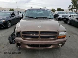 2000 Dodge Durango z VIN 1B4HR28Y4YF187411, wystawiony jako Copart lot #79060184 z przebiegiem 275 571 mil mil oraz Szkoda całkowita • Salvage title. Historia ofert i sprzedaży dostępna na DreamBid. Obrazek 5.