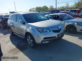 2012 Acura MDX with VIN 2HNYD2H29CH533726, listed as a IAAI auction lot 42106943 with 203,449 mi miles. Bid and sale history available at carsss.com. Image 1.