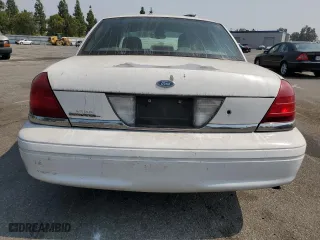 2007 Ford Crown Victoria LX with VIN 2FAFP74V47X119952, listed as a Copart auction lot 71025704 with 220,034 mi miles and Salvage Title. Bid and sale history available at carsss.com. Image 6.