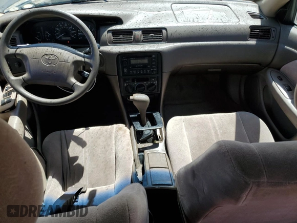 1999 Toyota Camry LE z VIN JT2BF22KXX0230830, wystawiony jako Copart lot #52253985 z przebiegiem 151 758 mil mil oraz Szkoda całkowita • Salvage title. Historia ofert i sprzedaży dostępna na DreamBid. Obrazek 8.