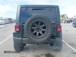 2017 Jeep Wrangler Unlimited Sport with VIN 1C4BJWDG1HL733474, listed as a IAAI auction lot 41395245 with 275,871 mi miles. Bid and sale history available at carsss.com. Image 17.