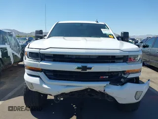 2016 Chevrolet Silverado 1500 LT with VIN 3GCUKREC5GG369915, listed as a IAAI auction lot 42082155 with 137,671 mi miles and . Bid and sale history available at DreamBid. Image 12.