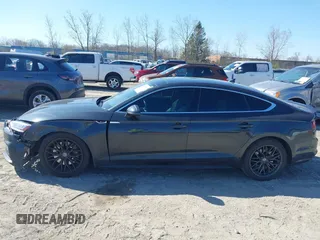 2018 Audi A5 Sportback Premium Plus with VIN WAUENCF53JA132769, listed as a IAAI auction lot 42037673 with 128,040 mi miles. Bid and sale history available at carsss.com. Image 14.