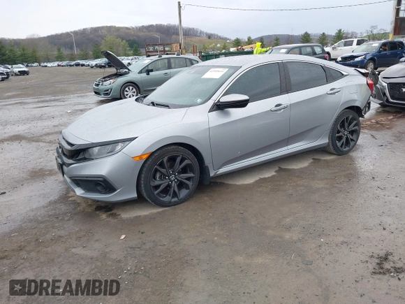 2019 Honda Civic Sport with VIN 19XFC2F81KE034047, listed as a IAAI auction lot 41995614 with 91,303 mi miles and . Bid and sale history available at DreamBid. Image 2.