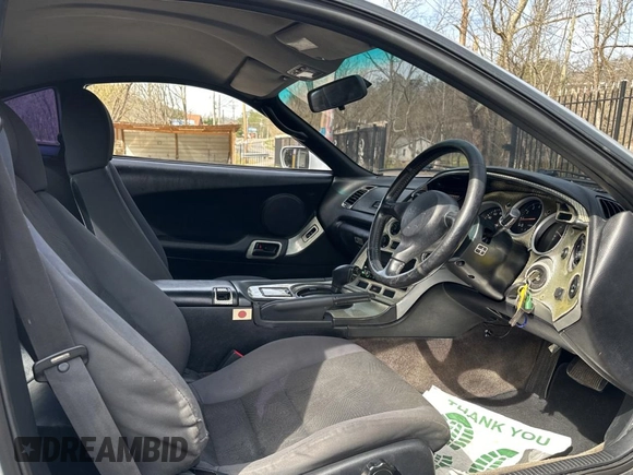 1993 Toyota Supra с VIN JZA800010229, выставлен на аукционе Copart как лот 50000065 с пробегом 130 612 миль миль и Чистый • Clean title. История ставок и продаж доступна на DreamBid. Изображение 5.