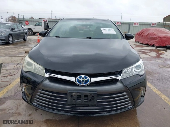 2015 Toyota Camry Hybrid LE with VIN 4T1BD1FK0FU148612, listed as a IAAI auction lot 41710518 with 126,248 mi miles. Bid and sale history available at carsss.com. Image 13.