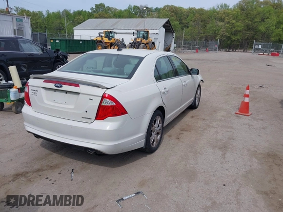 2012 Ford Fusion SE with VIN 3FAHP0HG7CR351904, listed as a IAAI auction lot 42115834 with 80,659 mi miles and . Bid and sale history available at DreamBid. Image 4.