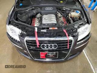 2009 Audi A8 z VIN WAULV94E29N007523, wystawiony jako Copart lot #50234305 z przebiegiem 97 535 mil mil oraz Szkoda całkowita • Salvage title. Historia ofert i sprzedaży dostępna na DreamBid. Obrazek 11.