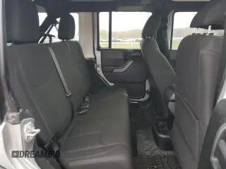2018 Jeep Wrangler JK Unlimited Sport S with VIN 1C4BJWDG2JL908286, listed as a Copart auction lot 77313844 with 69,497 mi miles and Salvage Title. Bid and sale history available at carsss.com. Image 11.
