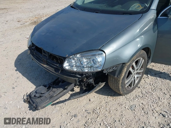 2006 Volkswagen Jetta 2.5L z VIN 3VWSF71K06M798437, wystawiony jako IAAI lot #42559453 z przebiegiem 169 485 mil mil oraz . Historia ofert i sprzedaży dostępna na DreamBid. Obrazek 6.