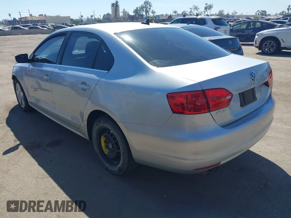 2012 Volkswagen Jetta TDI w/Premium with VIN 3VWLL7AJ8CM314305, listed as a IAAI auction lot 41885355 with 75,669 mi miles and . Bid and sale history available at DreamBid. Image 3.