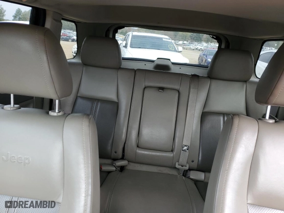 2007 Jeep Grand Cherokee Limited with VIN 1J8HR58267C572574, listed as a Copart auction lot 82717134 with 180,991 mi miles and Salvage Title. Bid and sale history available at carsss.com. Image 10.