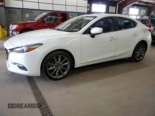 2018 Mazda 3 Touring z VIN 3MZBN1V39JM207372, wystawiony jako Copart lot #65366595 z przebiegiem 137 745 mil mil oraz Czysty tytuł • Clean title. Historia ofert i sprzedaży dostępna na DreamBid. Obrazek 1.