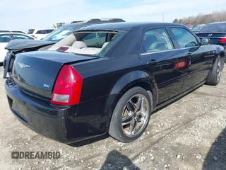 2006 Chrysler 300 with VIN 2C3KA43R66H330998, listed as a IAAI auction lot 41672105 with 168,422 mi miles. Bid and sale history available at carsss.com. Image 4.