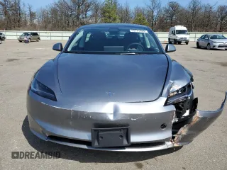 2025 Tesla Model 3 Long Range z VIN 5YJ3E1EBXSF979187, wystawiony jako Copart lot #53171955 z przebiegiem 198 mil mil oraz Szkoda całkowita • Salvage title. Historia ofert i sprzedaży dostępna na DreamBid. Obrazek 5.
