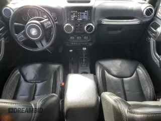 2018 Jeep Wrangler JK Unlimited Rubicon with VIN 1C4BJWFG0JL899973, listed as a Copart auction lot 41428895 with 88,357 mi miles and Salvage Title. Bid and sale history available at carsss.com. Image 8.