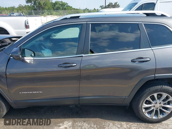 2019 Jeep Cherokee Latitude Plus with VIN 1C4PJLLB3KD143546, listed as a IAAI auction lot 42160353 with 69,296 mi miles and . Bid and sale history available at DreamBid. Image 15.