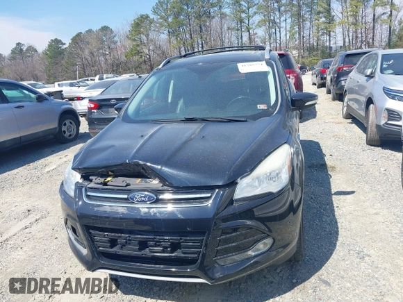 2016 Ford Escape Titanium with VIN 1FMCU0JX8GUC06601, listed as a IAAI auction lot 41785774 with 121,427 mi miles. Bid and sale history available at carsss.com. Image 12.