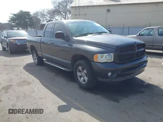 2002 Dodge 1500 with VIN 1D7HU18NX2S607033, listed as a IAAI auction lot 41644160 with 143,736 mi miles. Bid and sale history available at carsss.com. Image 1.