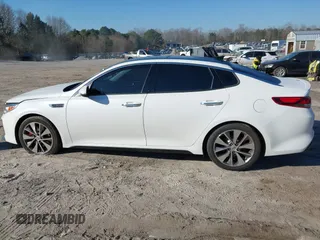 2016 Kia Optima SX Turbo with VIN 5XXGW4L2XGG084628, listed as a IAAI auction lot 41668592 with 116,535 mi miles and . Bid and sale history available at carsss.com. Image 14.