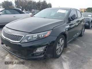 2015 Kia Optima Hybrid EX with VIN KNAGN4ADXF5080070, listed as a IAAI auction lot 41666446 with 119,845 mi miles. Bid and sale history available at carsss.com. Image 16.