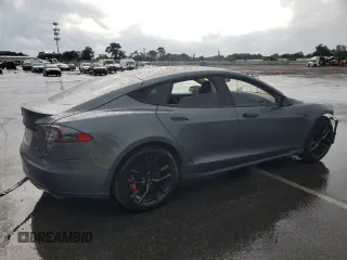 2014 Tesla Model S 60 with VIN 5YJSA1H14EFP28471, listed as a Copart auction lot 64928534 with 99,442 mi miles and Clean Title. Bid and sale history available at DreamBid. Image 3.