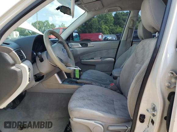 2009 Subaru Forester X with VIN JF2SH61699H769569, listed as a Copart auction lot 61189925 with 163,977 mi miles and Salvage title. Bid and sale history available at DreamBid. Image 7.