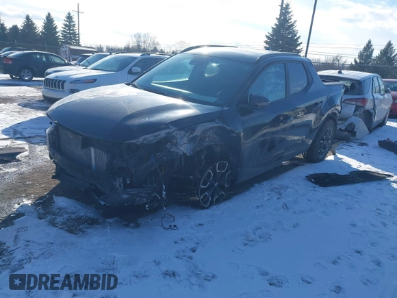 2022 Hyundai Santa Cruz SEL Premium z VIN 5NTJDDAF0NH037208, wystawiony jako IAAI lot #41536366 z przebiegiem 66 096 mil mil oraz . Historia ofert i sprzedaży dostępna na DreamBid. Obrazek 2.