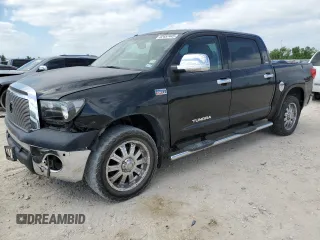 2012 Toyota Tundra 4WD Truck with VIN 5TFDW5F16CX247953, listed as a Copart auction lot 52457445 with 215,411 mi miles and Salvage Title. Bid and sale history available at carsss.com. Image 1.
