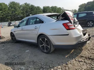 2014 Ford Taurus SEL with VIN 1FAHP2E8XEG184523, listed as a Copart auction lot 67643764 with 157,851 mi miles and Salvage Title. Bid and sale history available at carsss.com. Image 2.