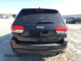 2017 Jeep Grand Cherokee Laredo with VIN 1C4RJEAG4HC952605, listed as a Copart auction lot 56693145 with 115,035 mi miles and Salvage title. Bid and sale history available at DreamBid. Image 6.